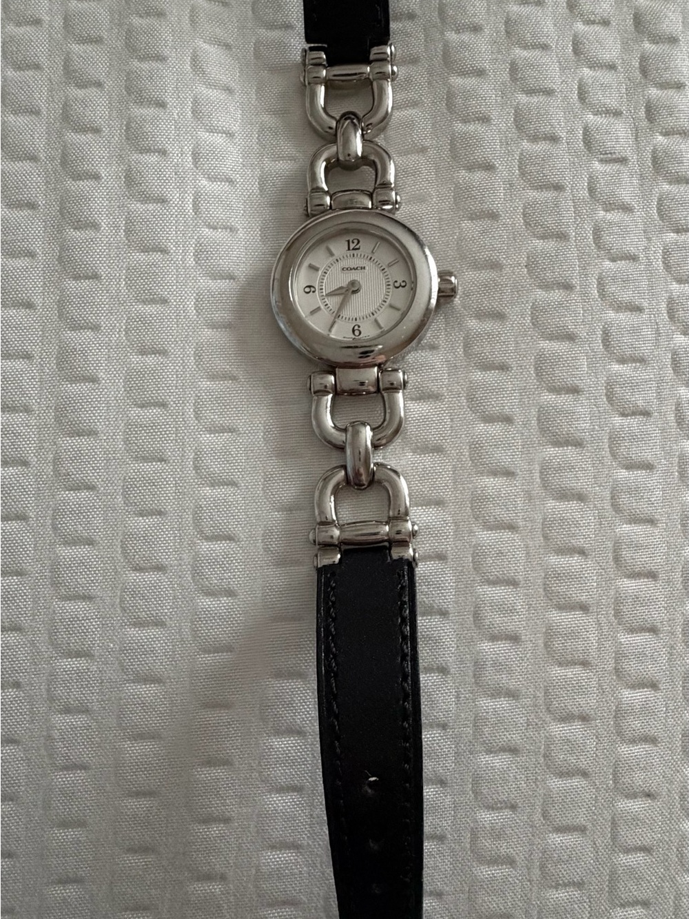 Coach Silver Buckle with Black Leather Strap and Red Accent